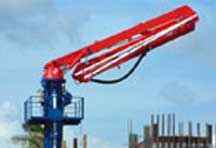 Red and blue stationary self climbing placing boom